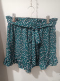Pantaloni scurți verde teal floral Cider față
