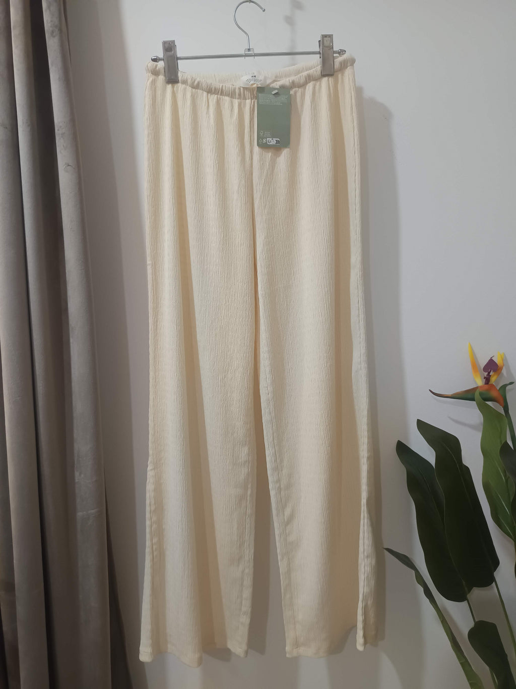 Pantaloni wide-leg crem crep texturat H&M copii - față