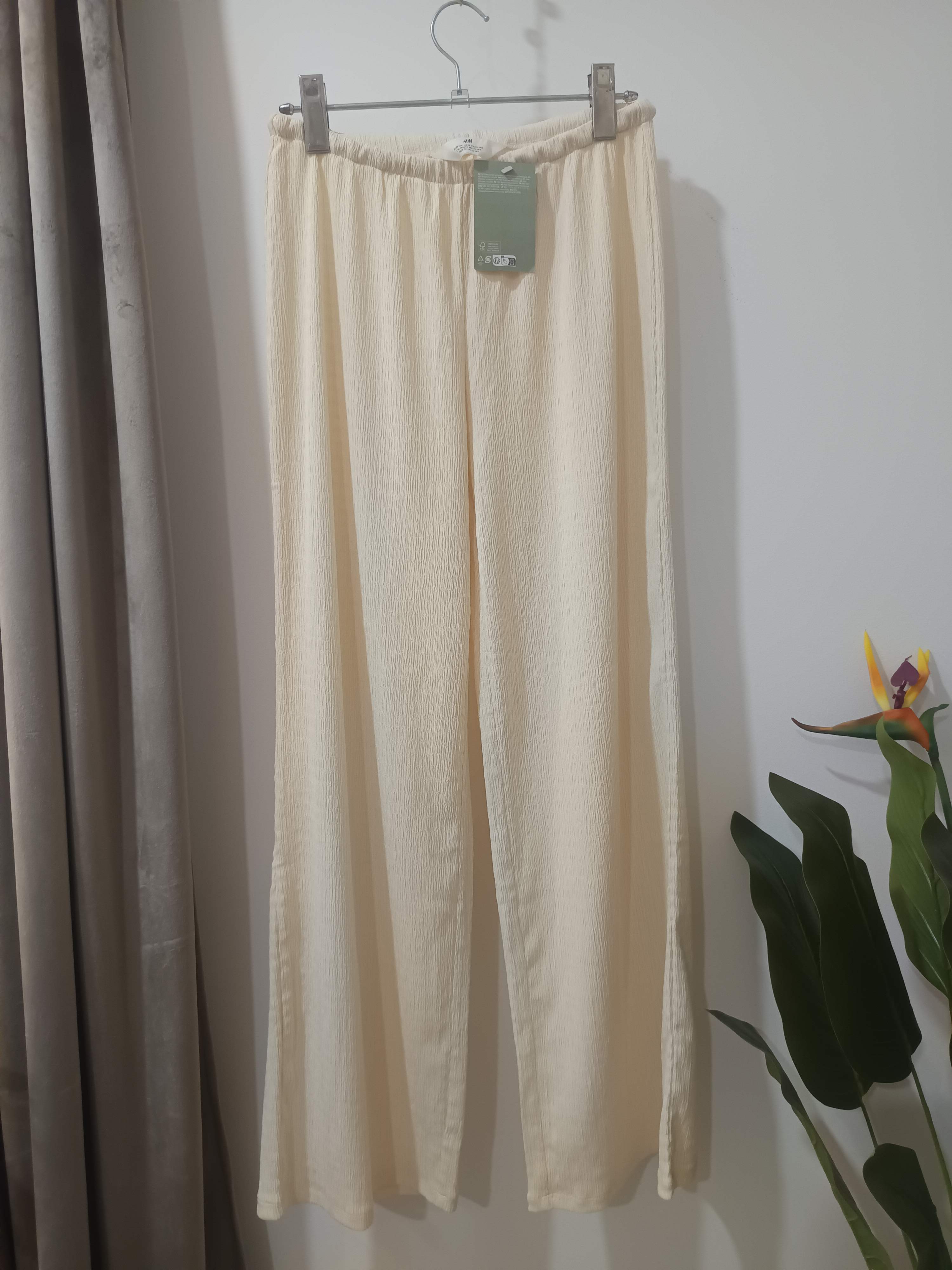 Pantaloni wide-leg crem crep texturat H&M copii - față